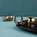 Three specialty minis, luxe lucky in luminous silver, luxe hospitality in warm bronze, and luxe love in radiant gold