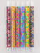 Set of five colorful pens with floral patterns on a white background