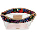 A clear plastic cosmetic pouch with a colorful floral patterned interior lining and a gold zipper, shown open against a white background.