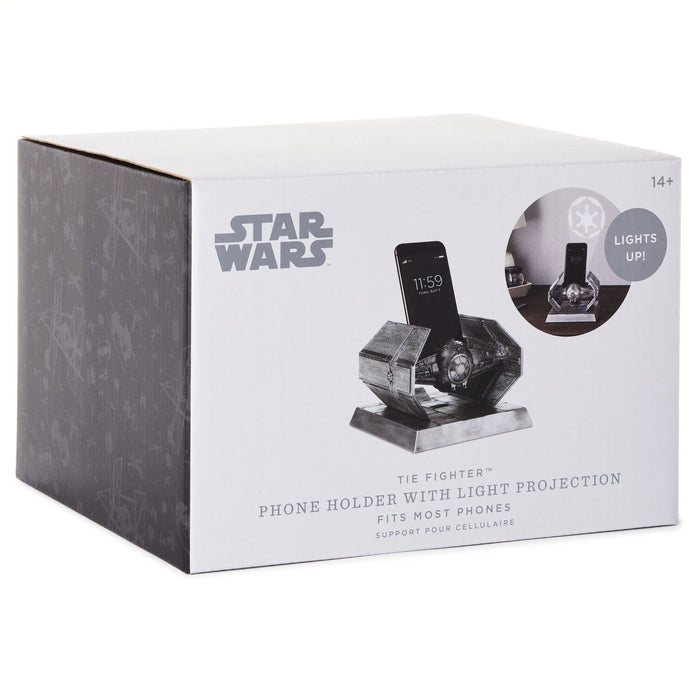 Box for a Star Wars phone holder with light projection on a white background