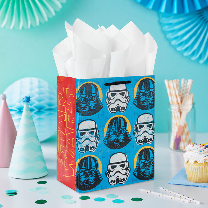 Star Wars-themed gift bag with Darth Vader and Stormtrooper designs on a festive background.