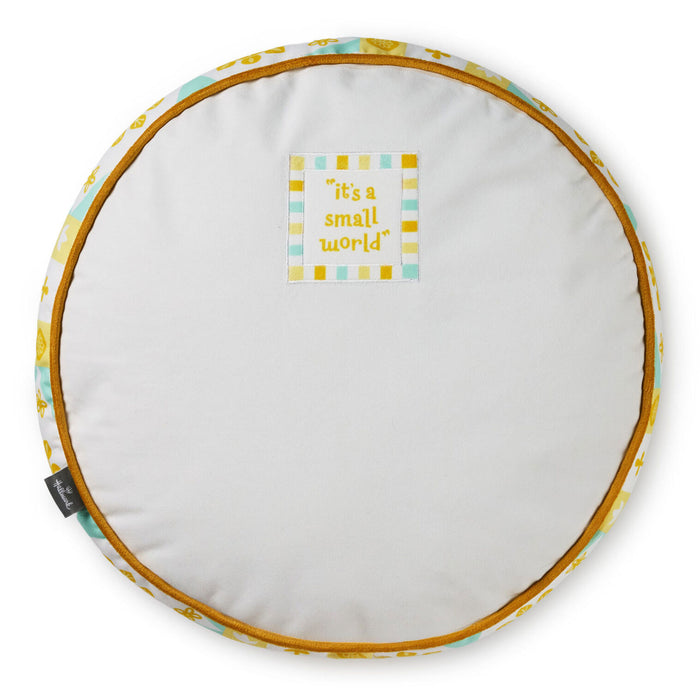 Round cushion with 'it's a small world' text on a white background