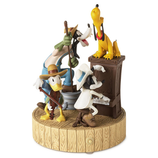 Animated character figurine set on a wooden base with a white background