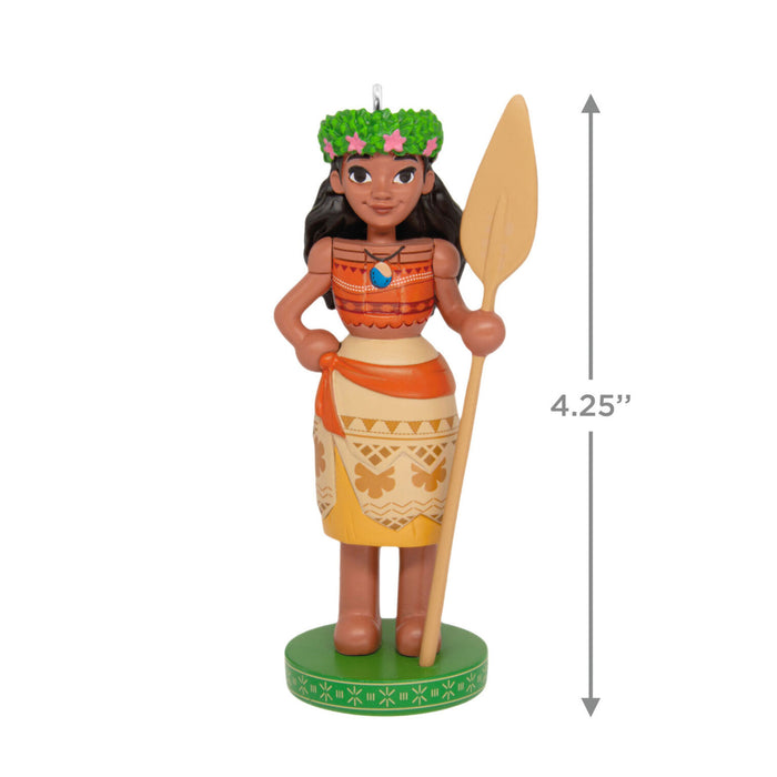 Figurine of a character from Disney's Moana holding a paddle, with a measurement label on a white background.