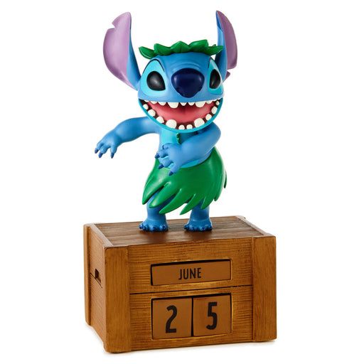Animated character figurine on a wooden crate with a calendar, on a white background