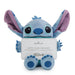 Plush toy resembling a character from Disney with a gift card holder on a white background