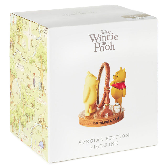 Winnie the Pooh figurine on a box with 'Winnie the Pooh' branding