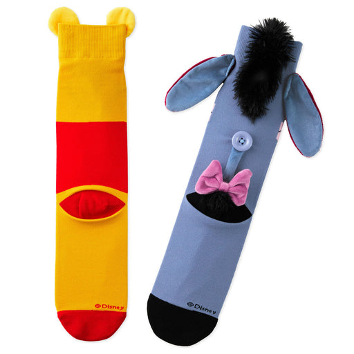 Two colorful socks with cartoon character designs on a white background