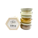 Stack of small jars with a hexagonal box labeled 'Tyler Candle Company Diva Gift Collection' on a white background.