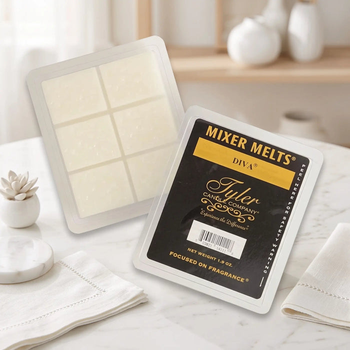Tyler Candle Company Mixer Melts packaging on a marble surface with a blurred background