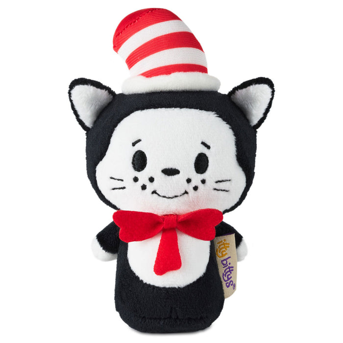 Plush toy resembling a character from a children's book with a red and white hat and bow tie on a white background.