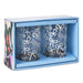A pair of clear glass tumblers with white bow patterns, presented inside a light blue gift box with a floral-patterned side panel.