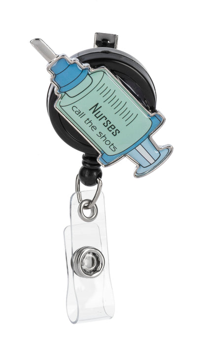 Retractable badge holder with syringe design and 'Nurses call the shots' text on a white background