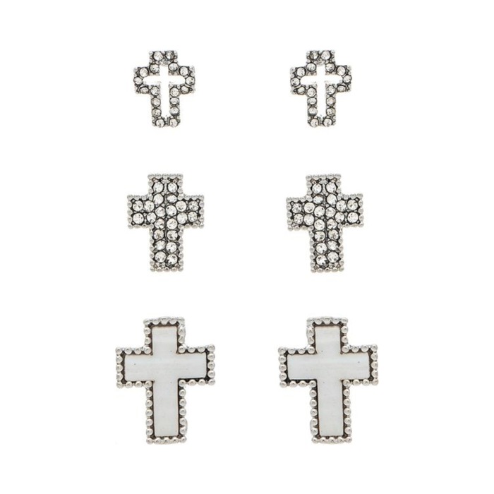 Set of cross-shaped earrings with rhinestone accents on a white background