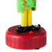 Toy figure with green top, yellow legs, black shoes, and red base on a white background