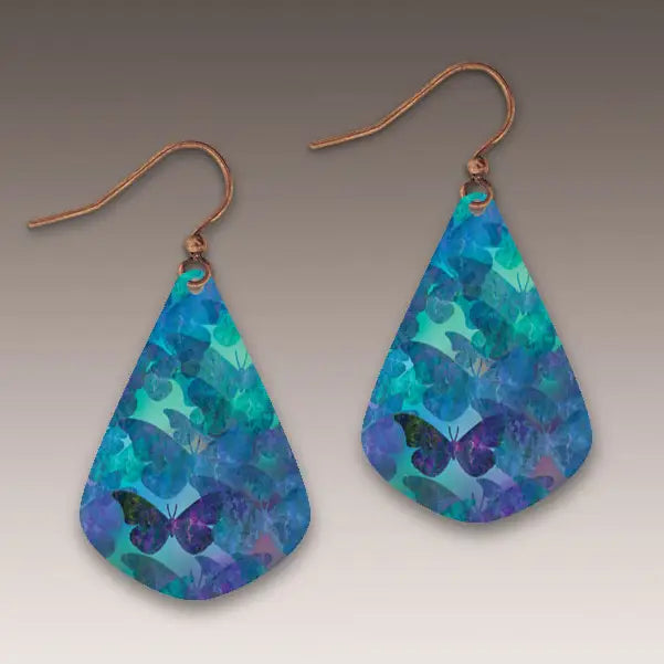 Teardrop-shaped earrings with butterfly design on a gray background
