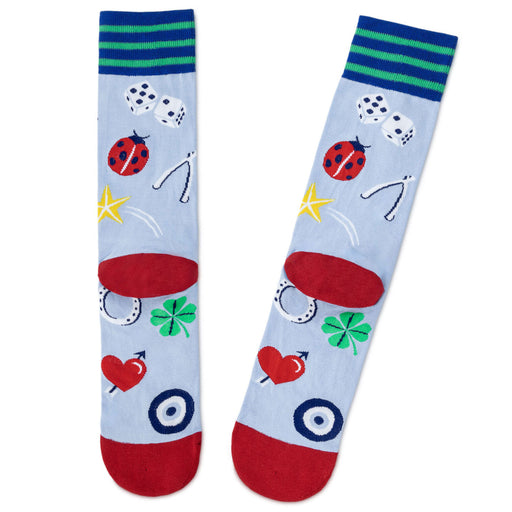 Colorful socks with various patterns on a light blue background