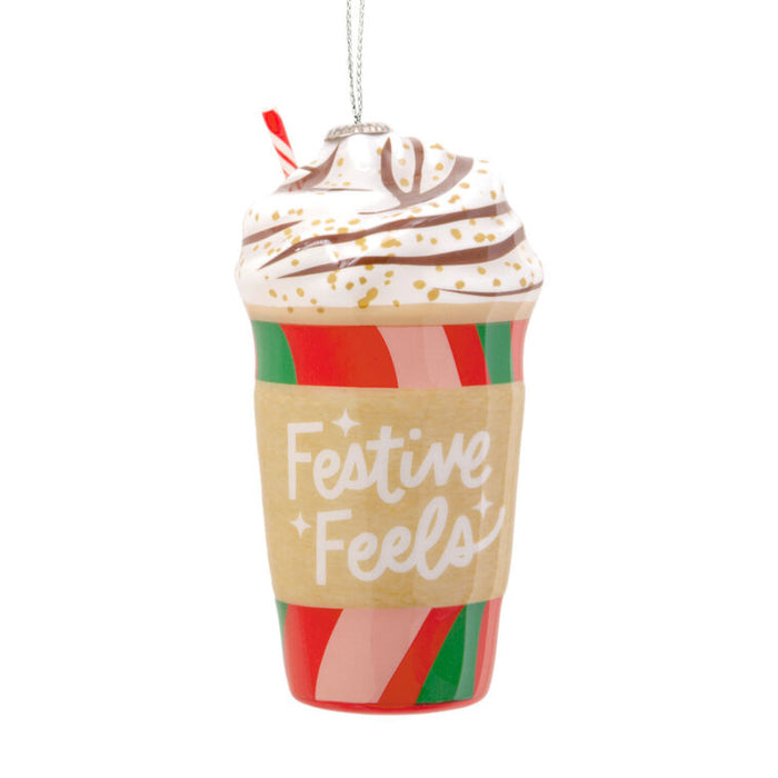 Decorative ornament shaped like a festive cup with whipped cream and 'Festive Feels' text on a white background.