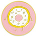 A circular enamel pin or sticker featuring a cute, smiling cartoon donut with white frosting, gold outlines, and small legs and arms, set against a pink background with a gold outer border.