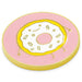A round enamel pin shaped like a smiling donut with a pink frosting base, white center, yellow icing outline, and small gold legs and dots, shown on a plain white background.