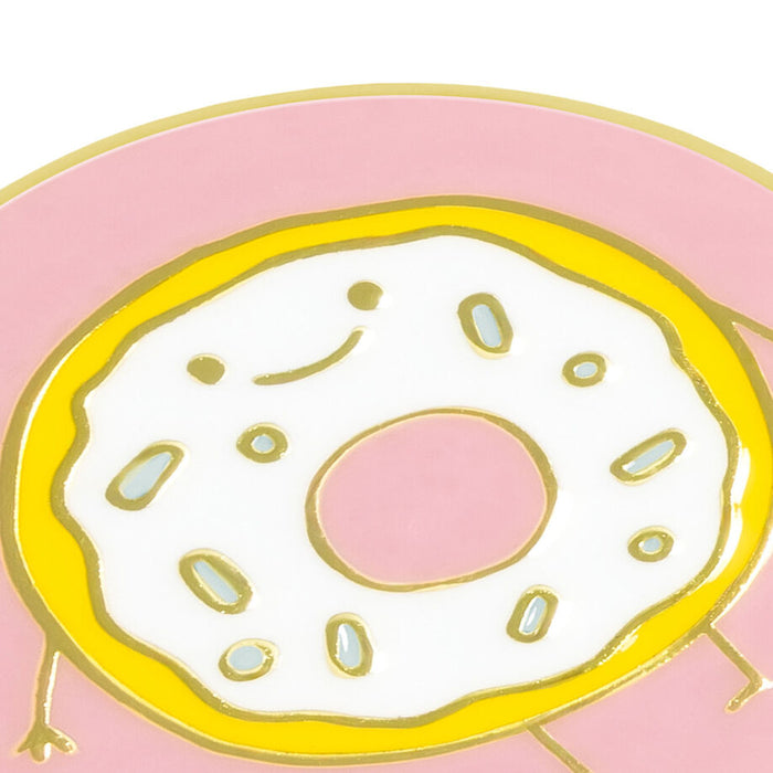 A stylized illustrated donut with a pink outer ring, yellow edge, white top, and small light blue sprinkle shapes on a white background.