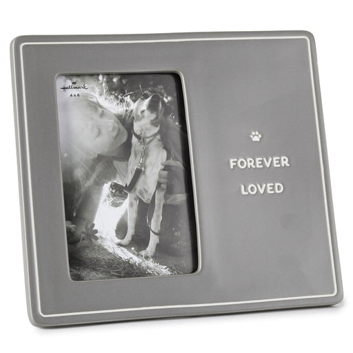 Gray photo frame with 'Forever Loved' text and a paw print, containing a black and white photo of a person and a dog.
