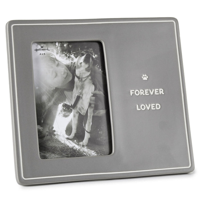 Gray photo frame with 'Forever Loved' text and a paw print, containing a black and white photo of a person and a dog.
