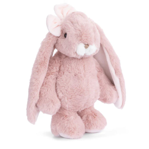 Plush toy rabbit with pink fur on a white background