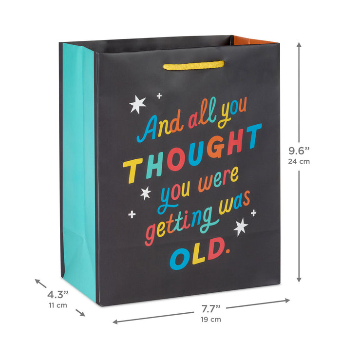 Gift bag with colorful text and dimensions on a white background