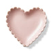 Pink heart-shaped ceramic plate on a white background