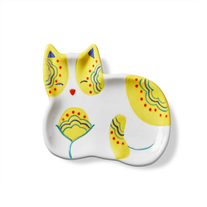Ceramic cat-shaped plate with yellow and blue design on a white background