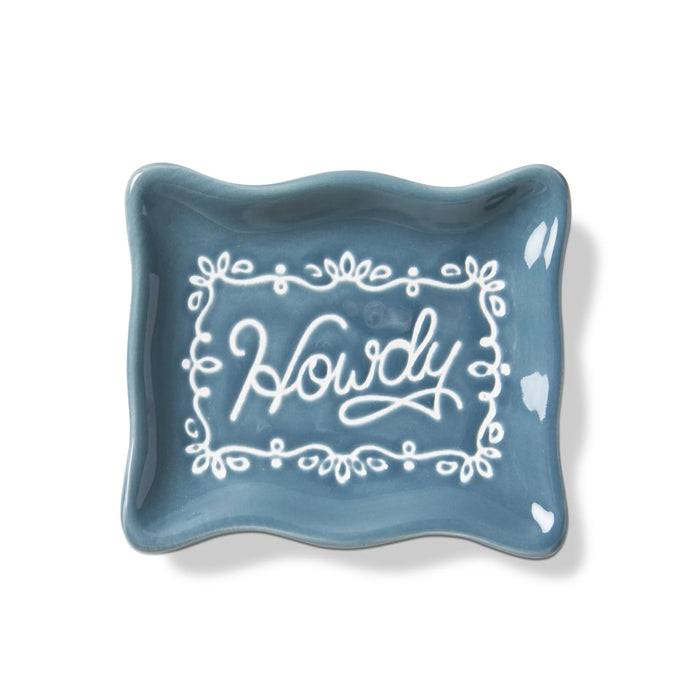 Blue ceramic dish with 'Howdy' text on a white background