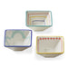 Three small ceramic bowls with colorful decorative edges on a white background