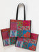Colorful patchwork tote bag on a white background