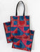 Set of three bags with red and blue pattern on a white background