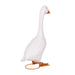 White goose decoy with orange feet on a white background