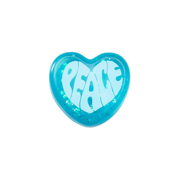 Blue heart-shaped object with 'PEACE' text on a white background