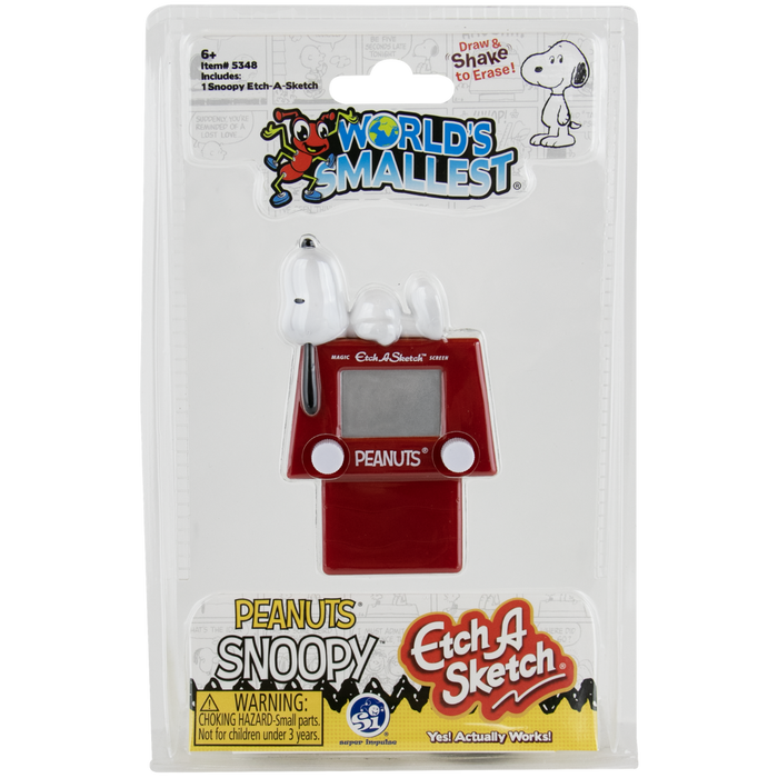Snoopy 'World's Smallest' Etch-A-Sketch toy in its original blister packaging, featuring a red hand-drawn sketch pad and a white pencil.