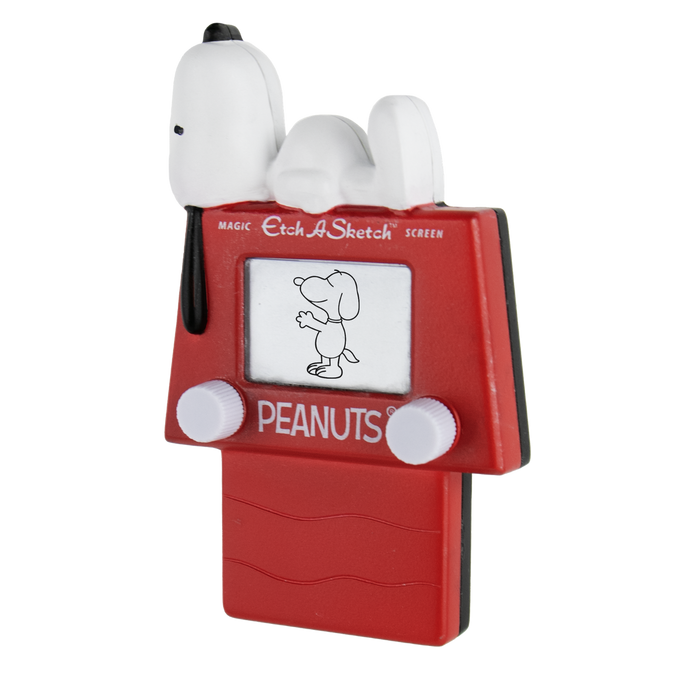 A red Magic Etch A Sketch screen toy featuring Snoopy and Woodstock figures on top, with 'PEANUTS' printed on the front, set against a plain white background.