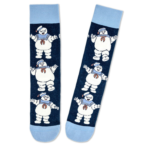 Pair of socks with cartoon character design on a white background