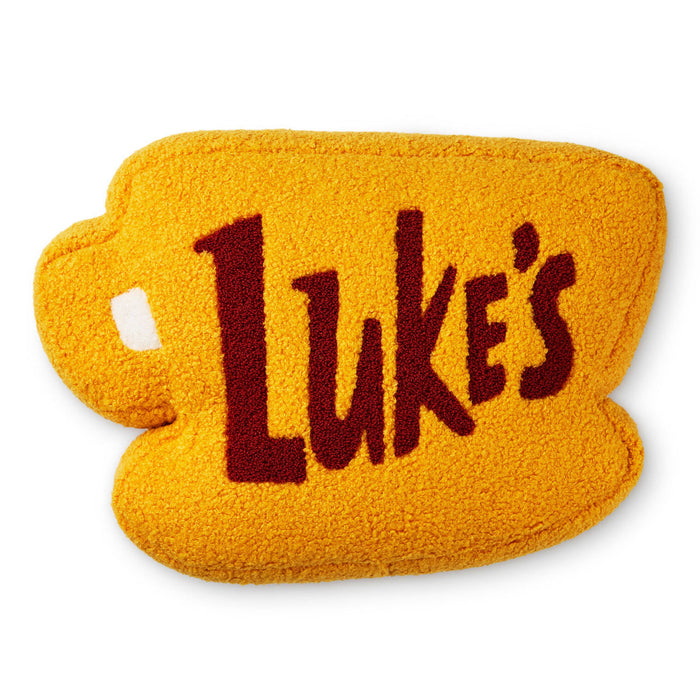 Yellow mug-shaped pillow with 'Luke's' text on a white background