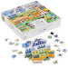 Jigsaw puzzle packaging with 'Stars Hollow' illustration and scattered pieces on a white background