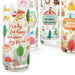 Set of colorful glass tumblers with festive designs and text on a white background
