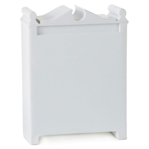 White decorative item with a triangular top on a white background