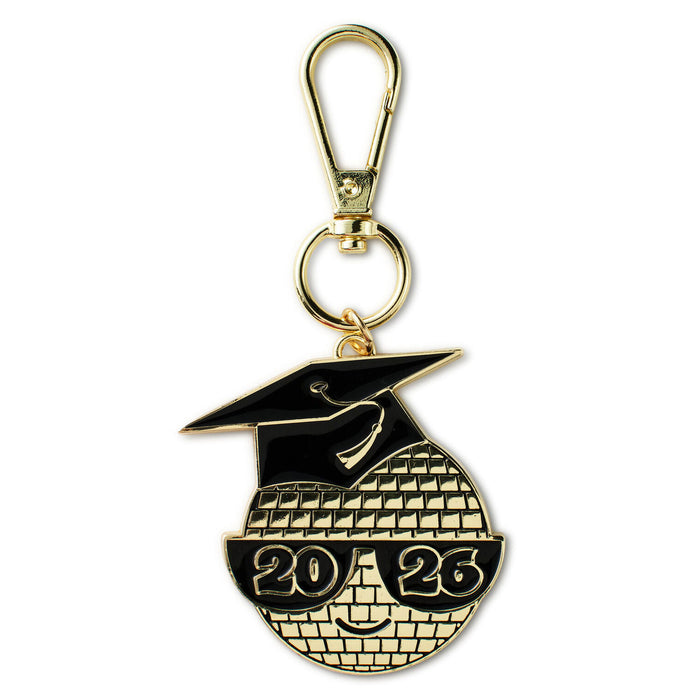Graduation-themed keychain with black cap and gold tassel, featuring the year 2023, on a white background.