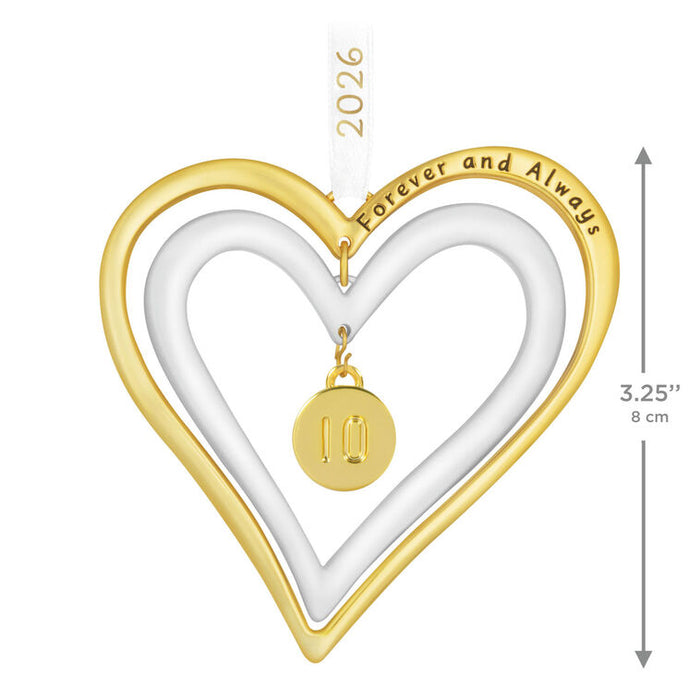 Two-toned heart-shaped pendant with 'Forever and Always' engraving and a small round pendant, with measurements indicated.