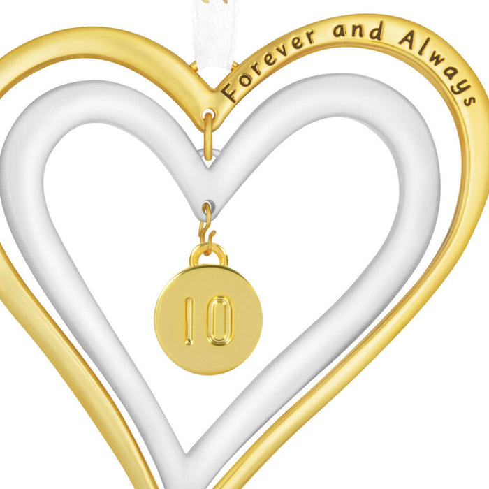 Heart-shaped gold and white ornament with 'Forever and Always' text and number '10' charm.