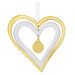 Gold and white heart-shaped pendant with a small round gold charm on a white background