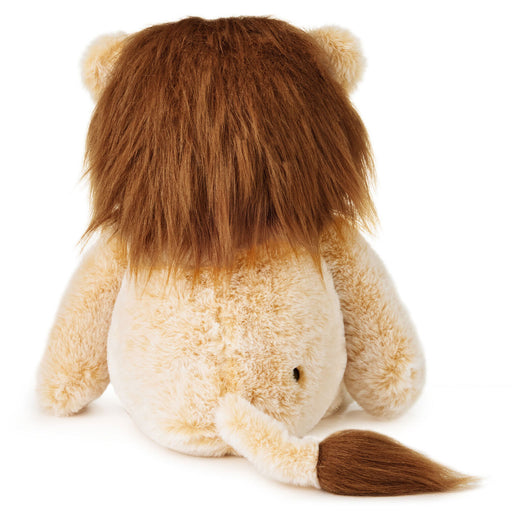 Plush lion toy from behind on a white background