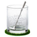 Clear glass tumbler with engraved text and golf club on a grassy base